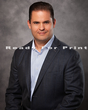 G. Moore Headshot 4x5-1 -